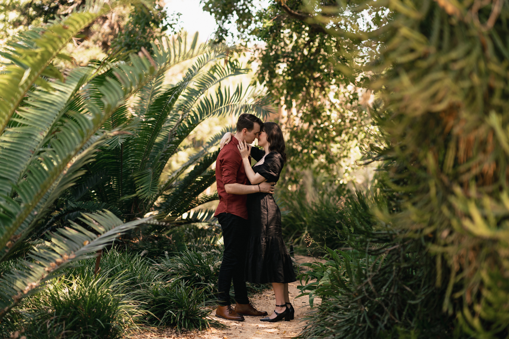 Proposal Photographer captures a couple right after their proposal in the Adelaide Botanic Gardens